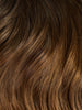 Close-up of brown hair with a wavy texture